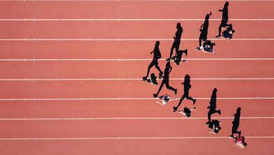 group of people running on stadium